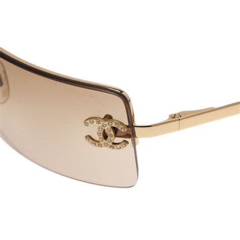 chanel round signature sunglasses gold|Chanel rimless sunglasses.